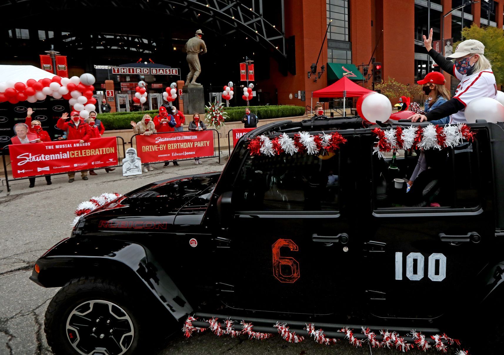 Drive-by parade celebrating 100th anniversary of The Man’s birth